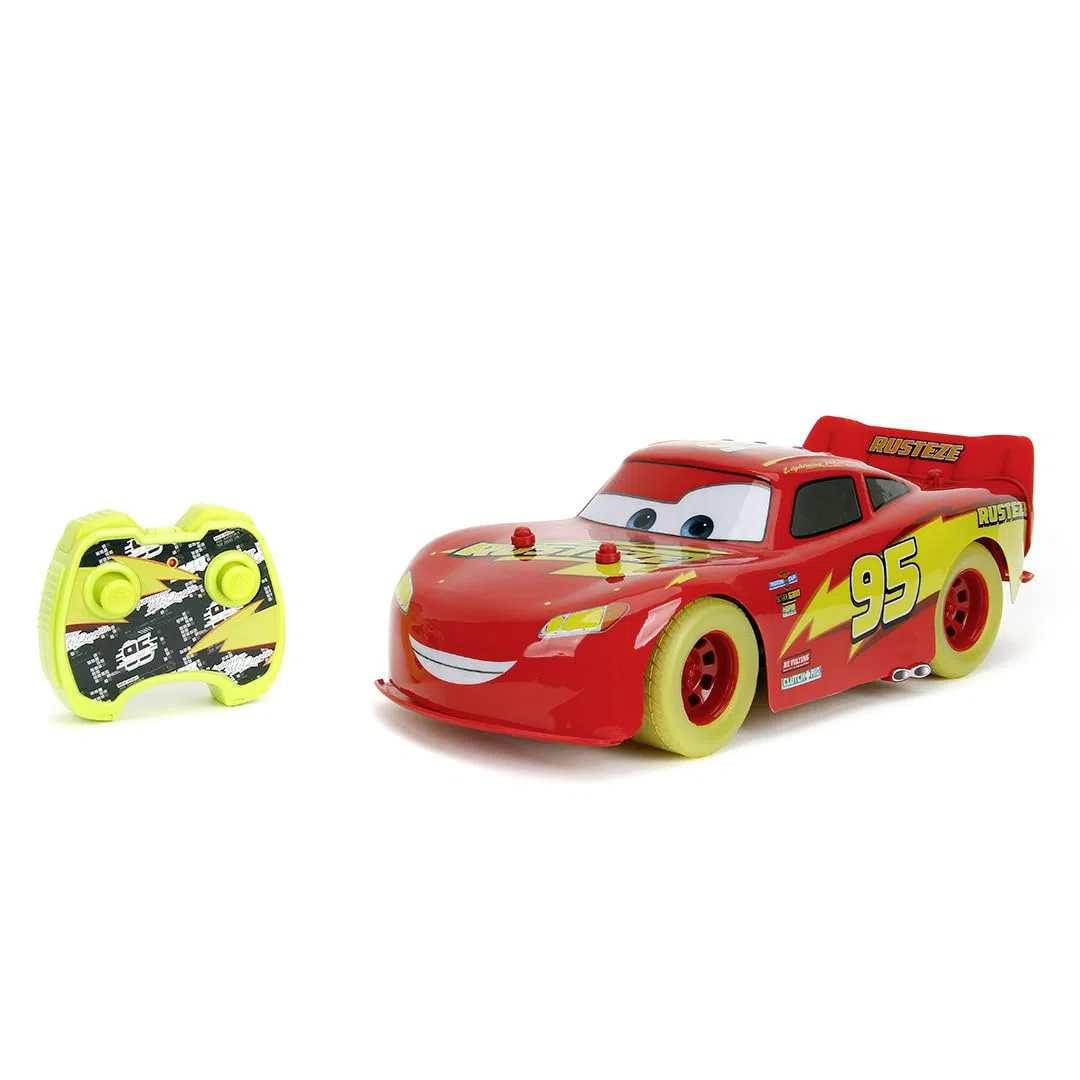Jada - Disney Cars Glow Racer RC Lightning McQueen scala 1:14, Auto Radiocomandata 31 cm con Luci e Effetti Glow in the Dark, 2,4 GHz, Funzione Turbo, Batteria Ricaricabile USB, +6 Anni, 9335563314R00