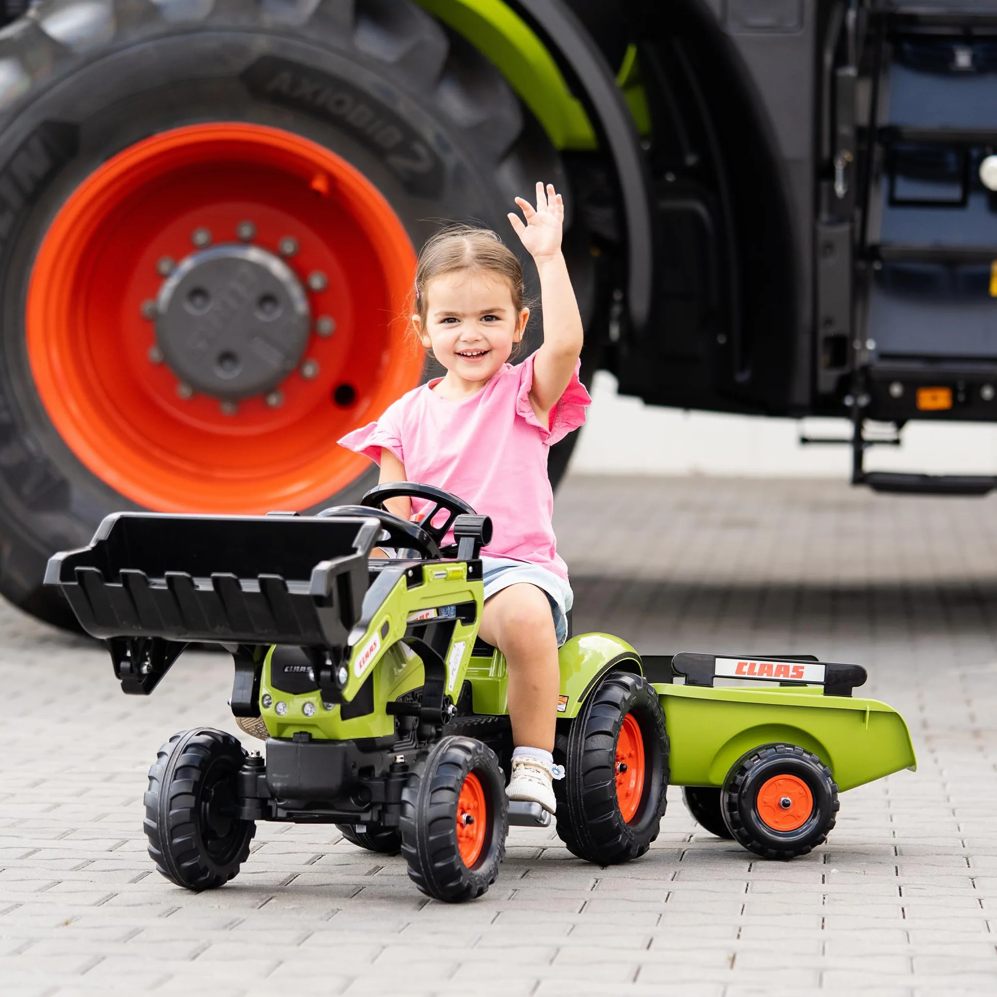 CLAAS Tractopelle Arion 410 avec remorque