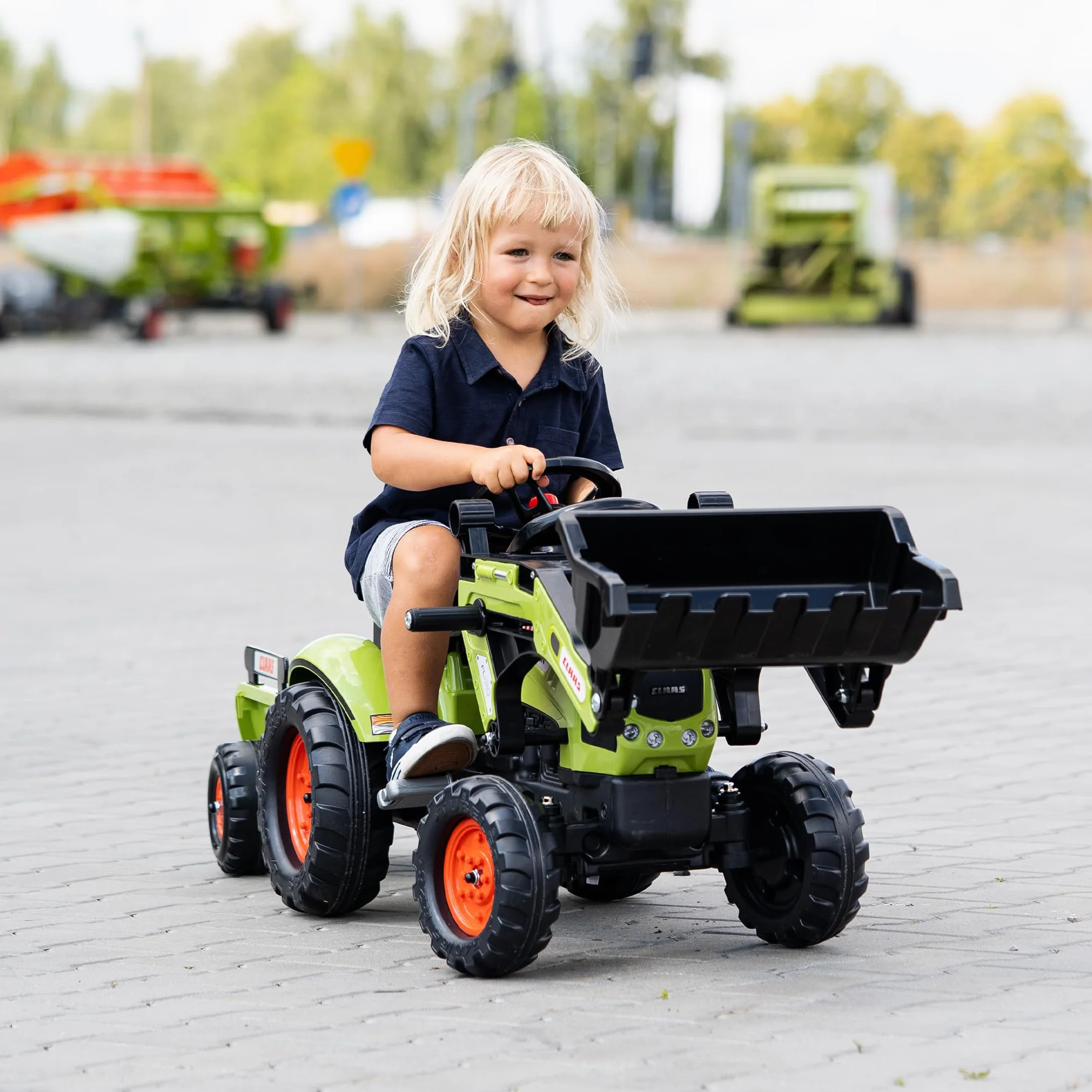 CLAAS Tractopelle Arion 410 avec remorque