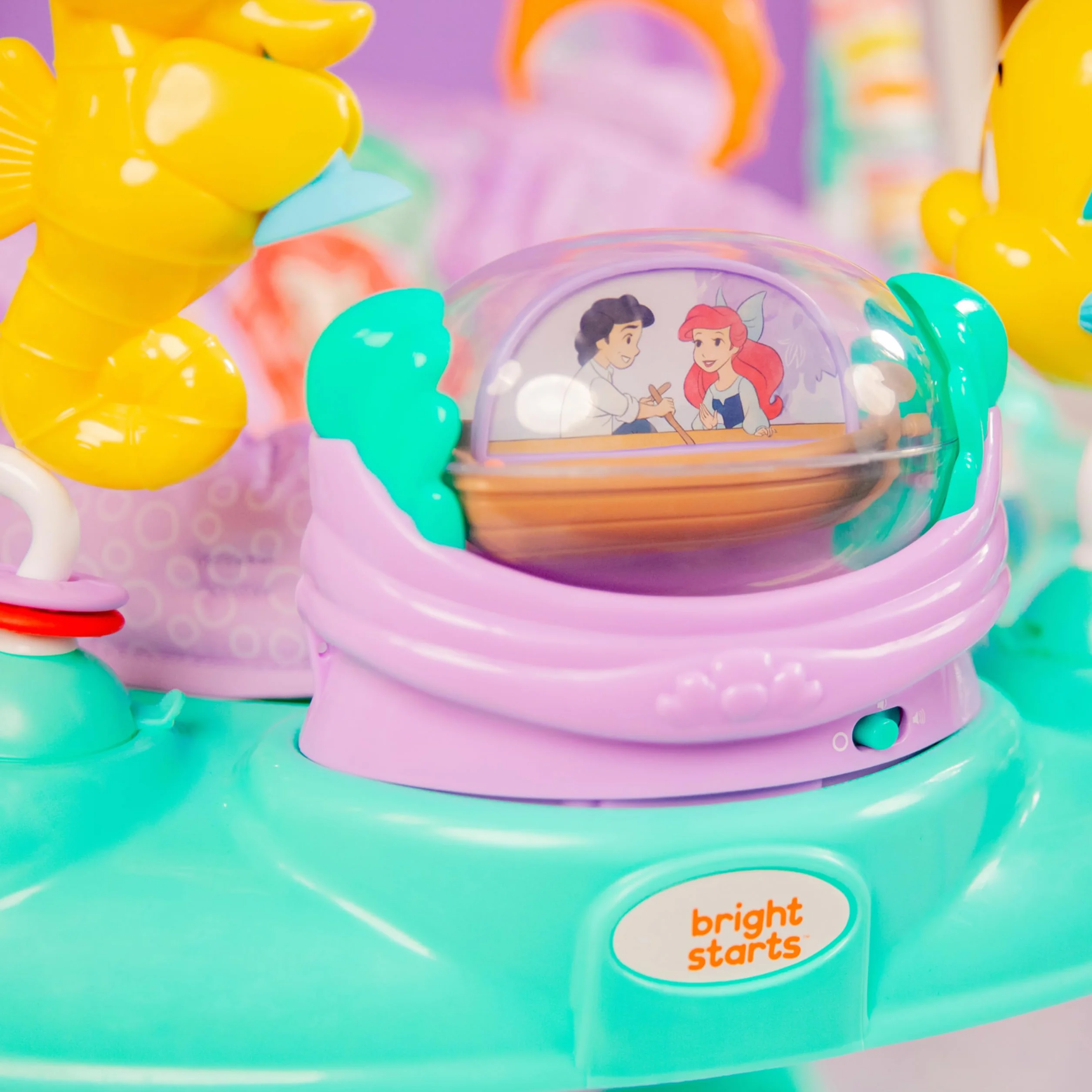Bright Starts, Disney Baby, Jumper multiattività Sea of Activities della Sirenetta, con Giocattoli interattivi, luci e Musica con Principessa Ariel di Disney, 6-12 Mesi (Blu)