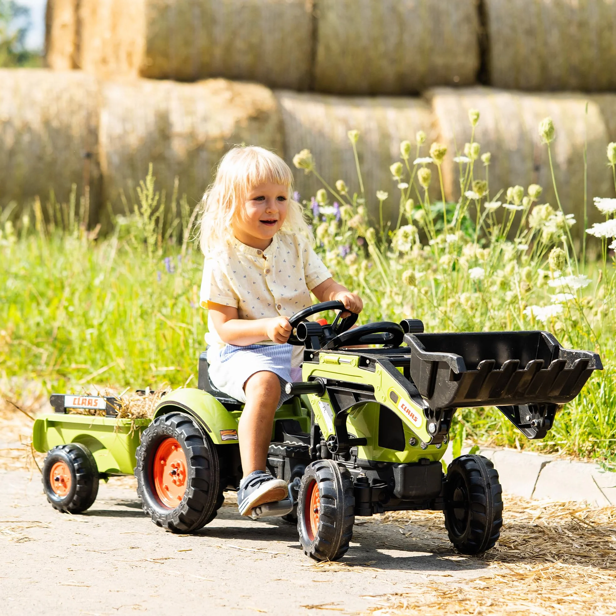 CLAAS Tractopelle Arion 410 avec remorque